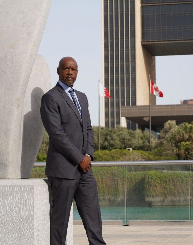 Man in suit standing outdoors