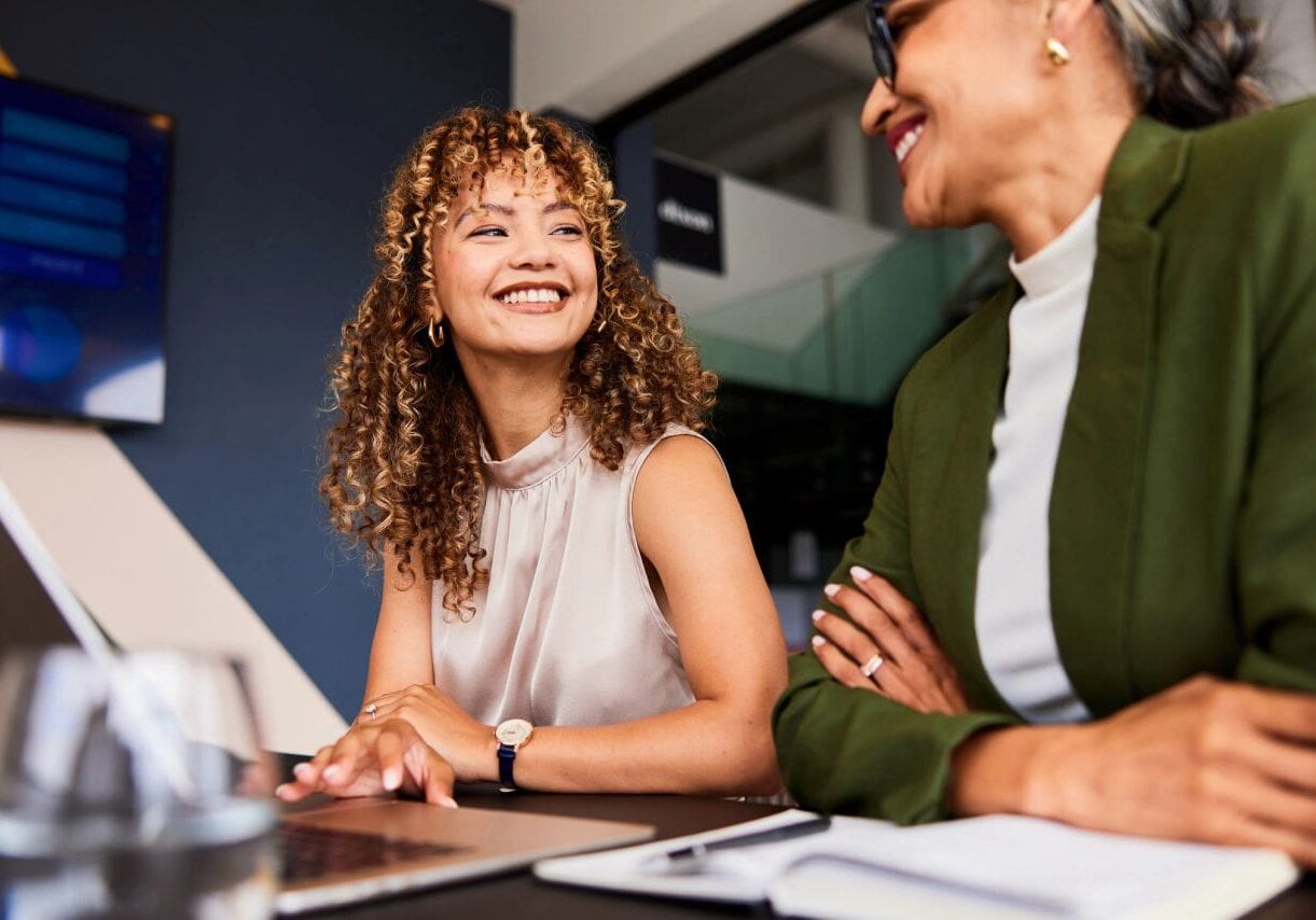 Professional women enjoying conversation together