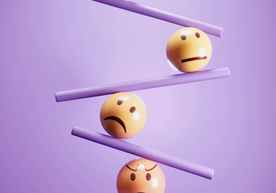Balancing emoticons on purple beams